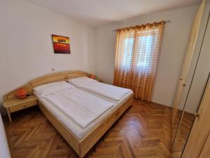 Postel nebo postele na pokoji v ubytování Apartment Jozic
