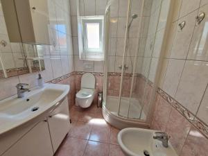 Koupelna v ubytování Apartment Jozic