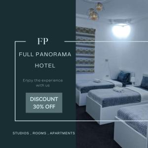 a hotel room with two beds and a sign that says fp full panorama at Full panorama Jerash (PLUS) in Jerash