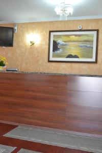 TV a/nebo společenská místnost v ubytování Hotel Rafeli