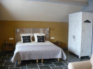 Postel nebo postele na pokoji v ubytování B&B Kamer en Aambeeld
