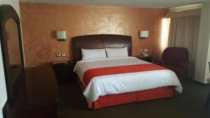 Postel nebo postele na pokoji v ubytování Hotel Don Ruben + 25 fotografií