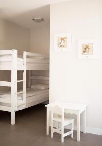 Krevet ili kreveti na sprat u jedinici u okviru objekta Hotel Autre Mer