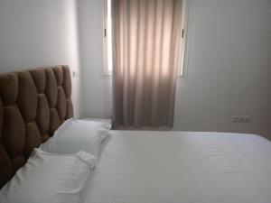 Ένα ή περισσότερα κρεβάτια σε δωμάτιο στο Bel appart 3p vue sur mer +4 φωτογραφίες