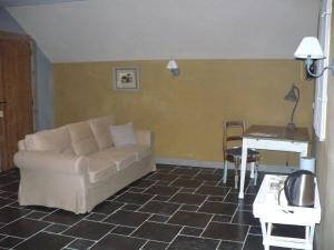 Posezení v ubytování B&B Kamer en Aambeeld