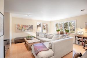 a living room with a couch and a table at Mountainside 4-bedroom Oasis Near Downtown Basalt in Basalt