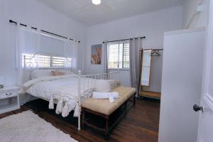 Ένα ή περισσότερα κρεβάτια σε δωμάτιο στο 13 Zunker Street Burnett Heads