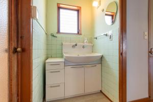 Et badeværelse på Villa Katsushikaお花茶屋駅徒歩10分 + 34 billeder