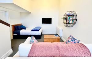 Posezení v ubytování Opoho Heritage Guest Suite