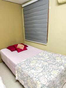 Lova arba lovos apgyvendinimo įstaigoje Dusun Indah Cottage 3