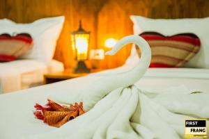 First and Frang Hotel - Koh Phangan客房内的一张或多张床位