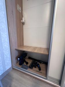 a cabinet with a bunch of tools in it at Liela Studio Liela Street in Liepāja