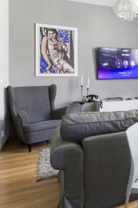 Posedenie v ubytovaní CENTRUM Apartment OLD TOWN Warsaw STARE MIASTO Historyczna kamienica umiejscowiona w zabytkowej części Warszawy Obok parku multimedialnego i barbakanu PARKING 24h Śniadanie opcjonaln Breakfast optional Check in from 14 pm PARTER ground floor