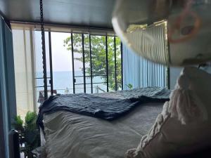 Postel nebo postele na pokoji v ubytování Padel Lodge Koh Chang