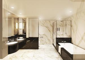 a bathroom with two sinks and a tub and a shower at The Westin Tokyo in Tokyo