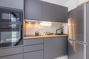 Kuchyňa alebo kuchynka v ubytovaní Sapore Di Mare Apartments