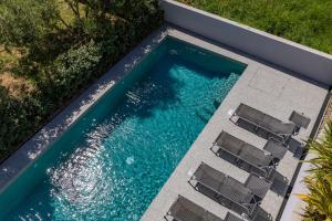 Bazén v ubytovaní Sapore Di Mare Apartments alebo v jeho blízkosti