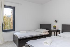 Posteľ alebo postele v izbe v ubytovaní Sapore Di Mare Apartments
