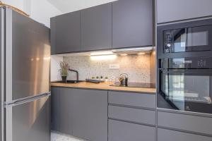 Kuchyňa alebo kuchynka v ubytovaní Sapore Di Mare Apartments