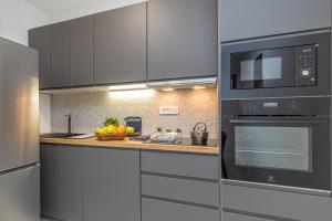 Kuchyňa alebo kuchynka v ubytovaní Sapore Di Mare Apartments