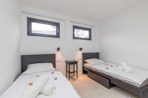 Posteľ alebo postele v izbe v ubytovaní Sapore Di Mare Apartments