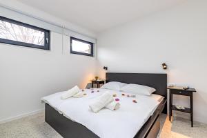 Posteľ alebo postele v izbe v ubytovaní Sapore Di Mare Apartments + 37 fotografií