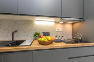 Kuchyňa alebo kuchynka v ubytovaní Sapore Di Mare Apartments