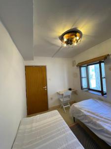 Postel nebo postele na pokoji v ubytování Heat Hostel