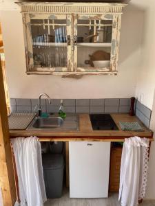 Kuchyň nebo kuchyňský kout v ubytování Heat Hostel