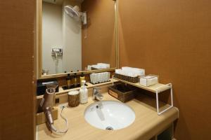 Koupelna v ubytování Dormy Inn Chiba City Soga