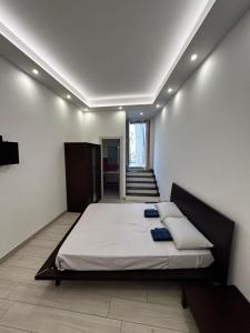 Katil atau katil-katil dalam bilik di Leonardo Sicilian Casa