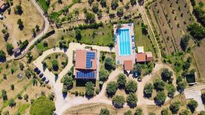 an aerial view of a house with solar panels on it at Case Mistretta in Altavilla Milicia