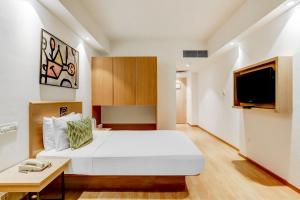 Katil atau katil-katil dalam bilik di Lemon Tree Hotel, Ahmedabad