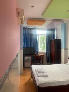 Postel nebo postele na pokoji v ubytování Hoang Hai Dang 1 Hotel + 29 fotografií
