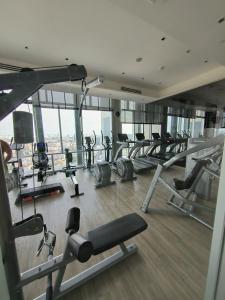a gym with a lot of cardio equipment in a building at centric sea Pattaya in Pattaya Central