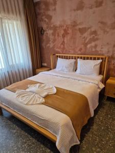 Ένα ή περισσότερα κρεβάτια σε δωμάτιο στο BKM Hostel
