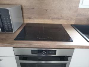 Cucina o angolo cottura di New villa 5mn from the beach-Pyrenees view