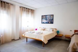 Postel nebo postele na pokoji v ubytování Pennaluce