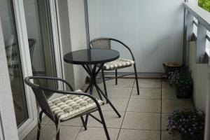 Balkón alebo terasa v ubytovaní Przytulny apartament na Brzasku