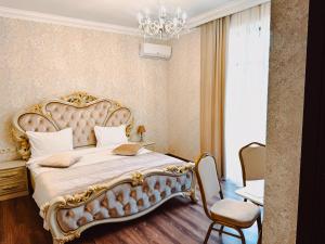 Voodi või voodid majutusasutuse Armenia Hotel toas
