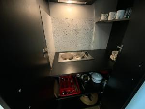 Kuchyňa alebo kuchynka v ubytovaní Első Fecske apartmanok