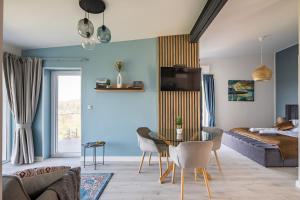 Posedenie v ubytovaní Akvarell Apartmanház