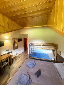 Postel nebo postele na pokoji v ubytování Hotel Biancaneve