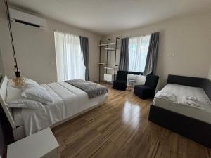 Postel nebo postele na pokoji v ubytování A un passo dal passo b&b