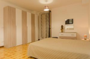 Letto o letti in una camera di Casa I Gabbiani