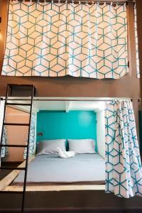 Ein Bett oder Betten in einem Zimmer der Unterkunft Lost & Found Zanzibar