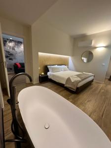 Postel nebo postele na pokoji v ubytování A un passo dal passo b&b