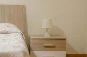 Letto o letti in una camera di Casa I Gabbiani