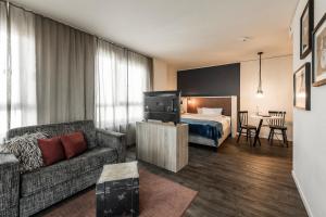 Postel nebo postele na pokoji v ubytování HARBR. boardinghouse Ludwigsburg