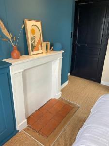 Letto o letti in una camera di Ancienne Mairie - Gite de charme à la campagne